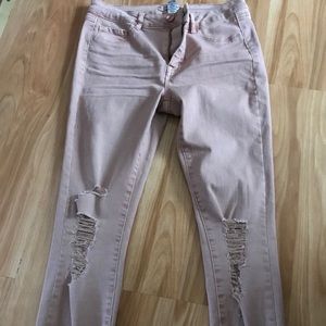 Light pink distressed skinny jeans